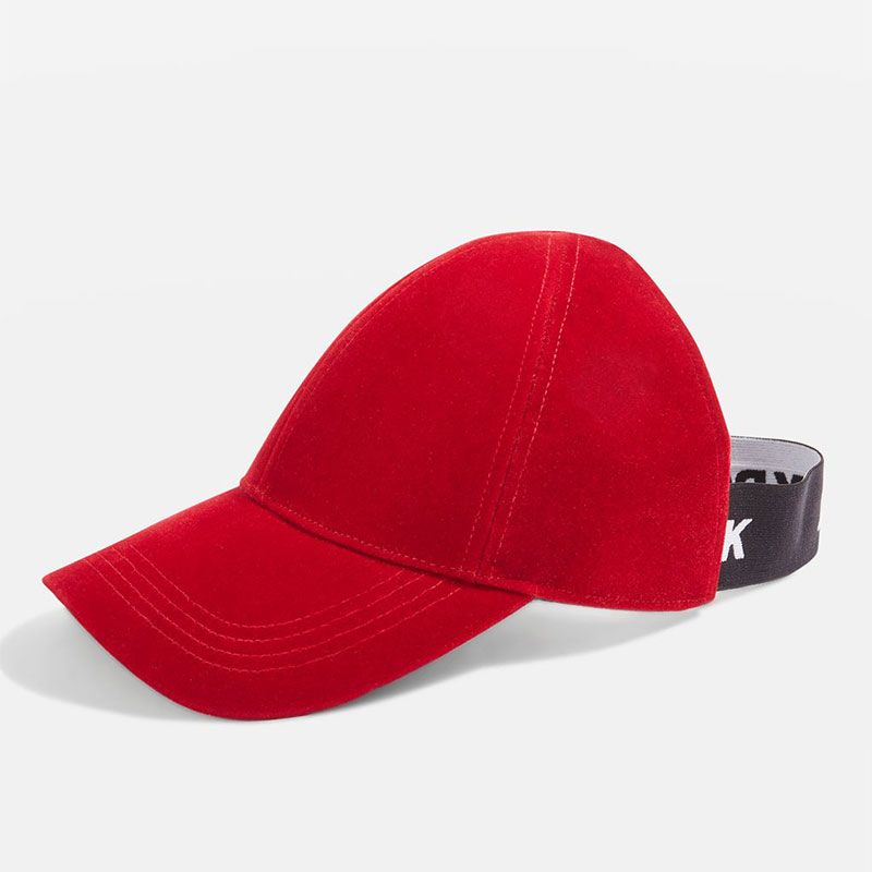 Clothing, Cap, Red, Cricket cap, Baseball cap, Hat, Costume accessory, Headgear, Fashion accessory, Costume hat, 