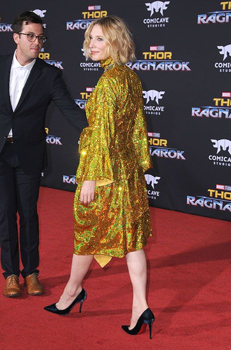 Red carpet, Clothing, Carpet, Premiere, Yellow, Footwear, Flooring, Event, Dress, Outerwear, 