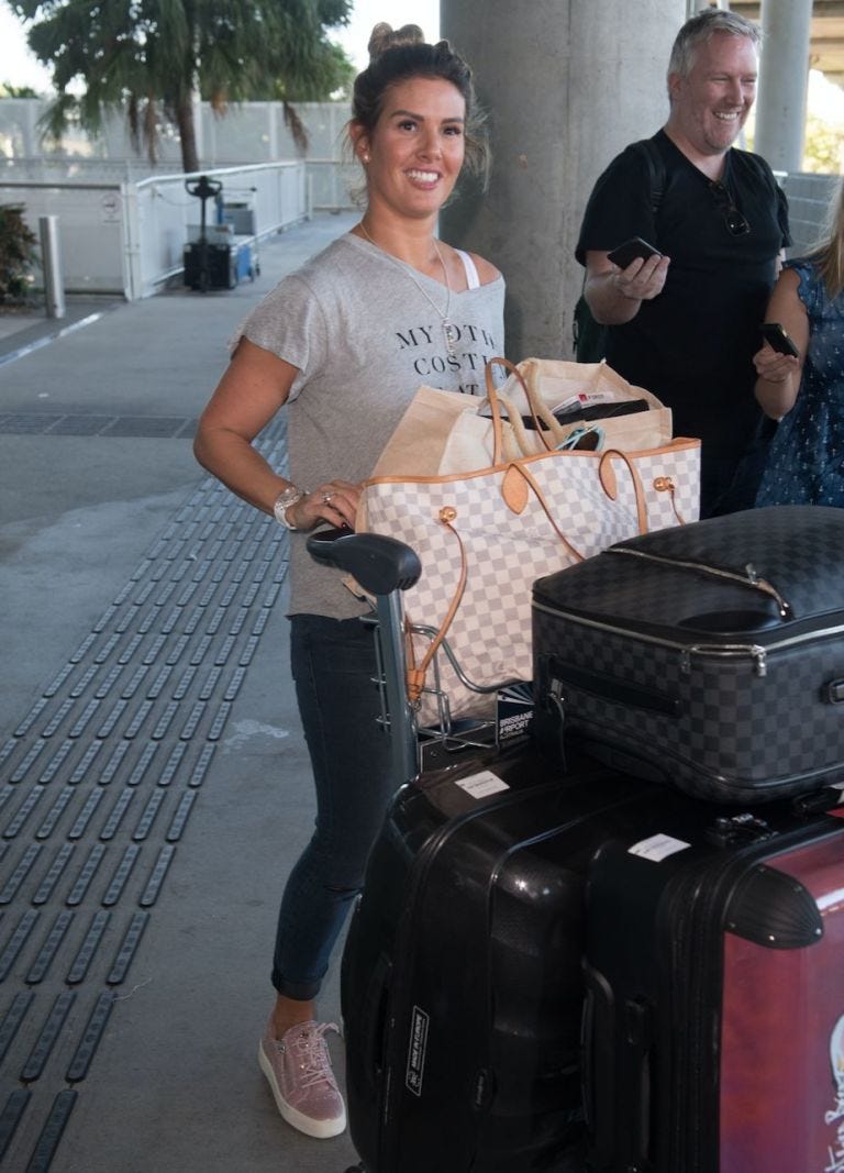 Human body, Luggage and bags, Denim, Bag, Street fashion, Sandal, Baggage, Foot, Cobblestone, Ankle, 