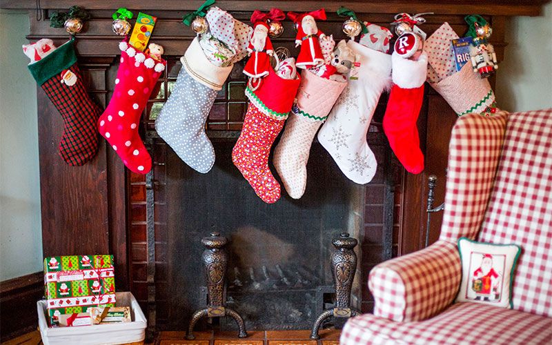 Christmas stocking, Christmas decoration, Christmas, Tree, Christmas eve, Interior design, Room, Holiday, Event, Stocking, 