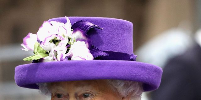 Purple, Hat, Violet, Fashion accessory, Smile, Headgear, Costume hat, Tradition, Flower, Plant, 