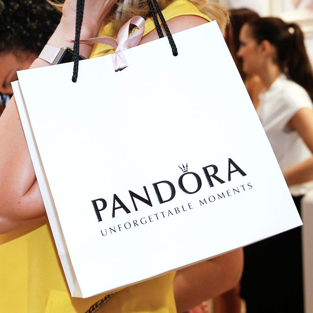 Font, Yellow, Fashion, Shopping bag, Material property, Shopping, Paper bag, Brand, Packaging and labeling, Logo, 