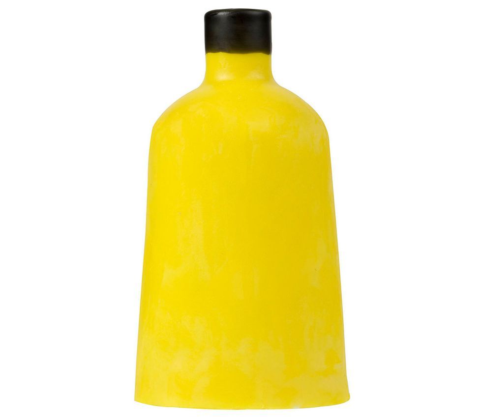 Yellow, Bottle, Liqueur, Wine bottle, Glass bottle, Plastic bottle, Drink, Plastic, 