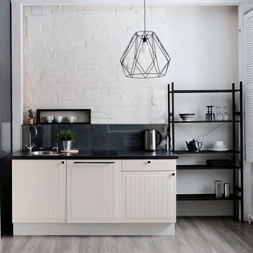 furniture, room, countertop, cabinetry, kitchen, interior design, property, floor, wall, tile,