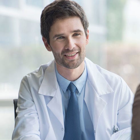 White-collar worker, Chin, Smile, Forehead, Jaw, Businessperson, Neck, Suit, Formal wear, Gesture, 