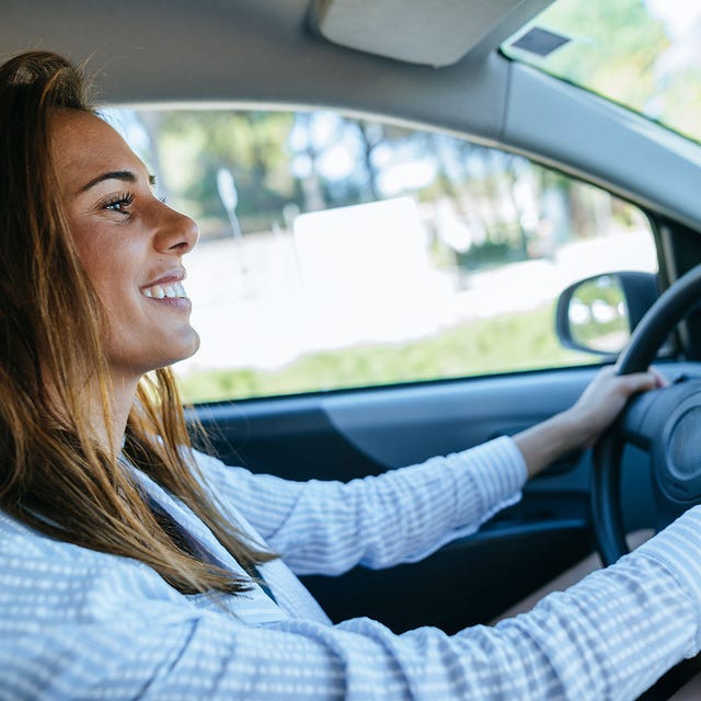 Driving, Vehicle door, Steering wheel, Steering part, Vehicle, Blond, Car, Automotive design, Family car, Hand, 