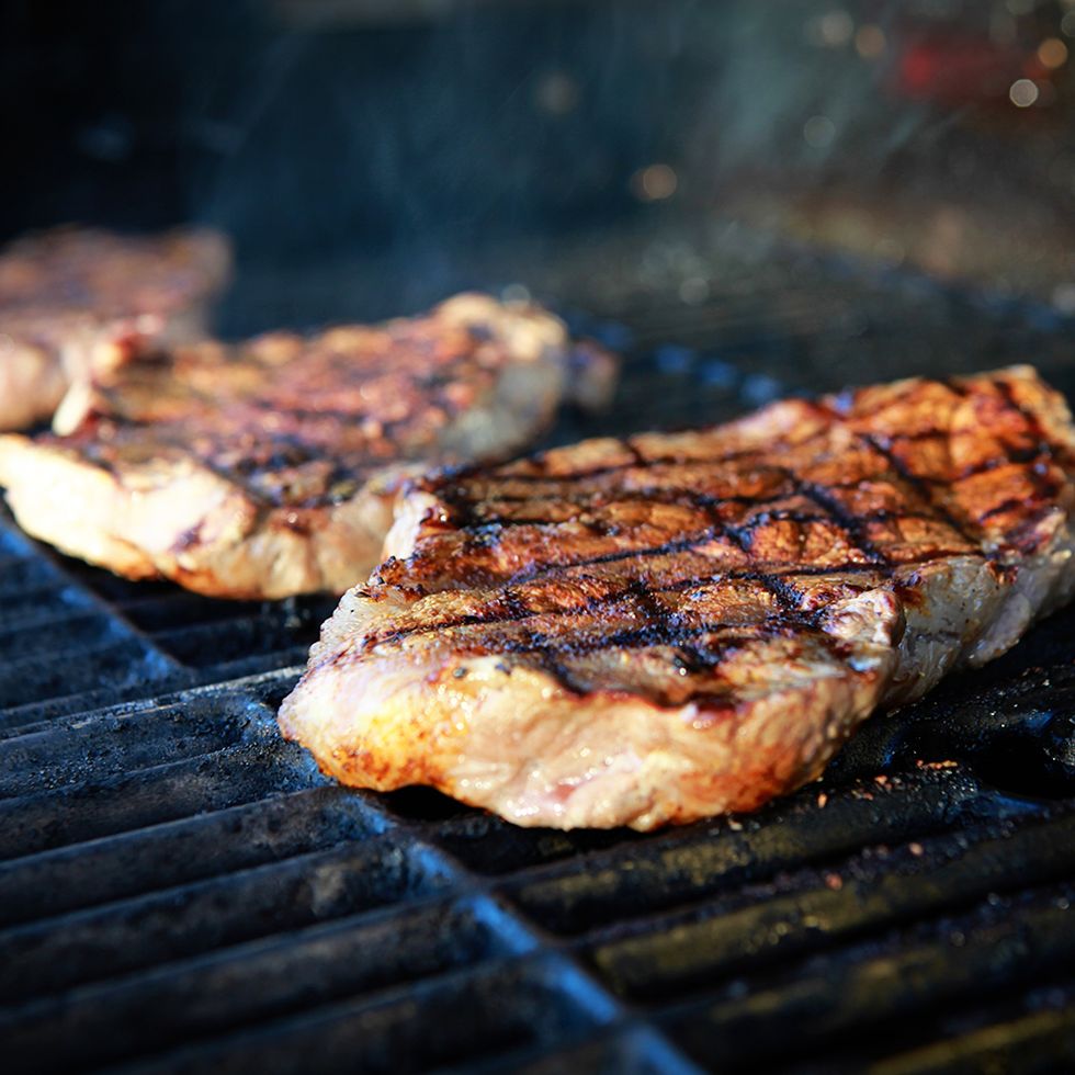 Barbecue, Barbecue grill, Grilling, Food, Pork chop, Outdoor grill, Rib eye steak, Dish, Cuisine, Steak, 