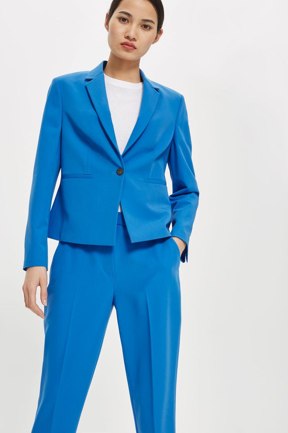 Clothing, Suit, Formal wear, Blue, Pantsuit, Cobalt blue, Outerwear, Electric blue, Standing, Tuxedo, 