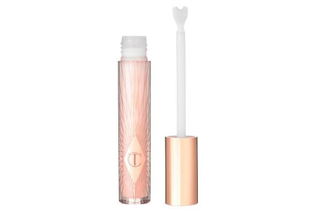 Cosmetics, Lip gloss, Product, Beauty, Beige, Brown, Eye, Pink, Material property, Liquid, 