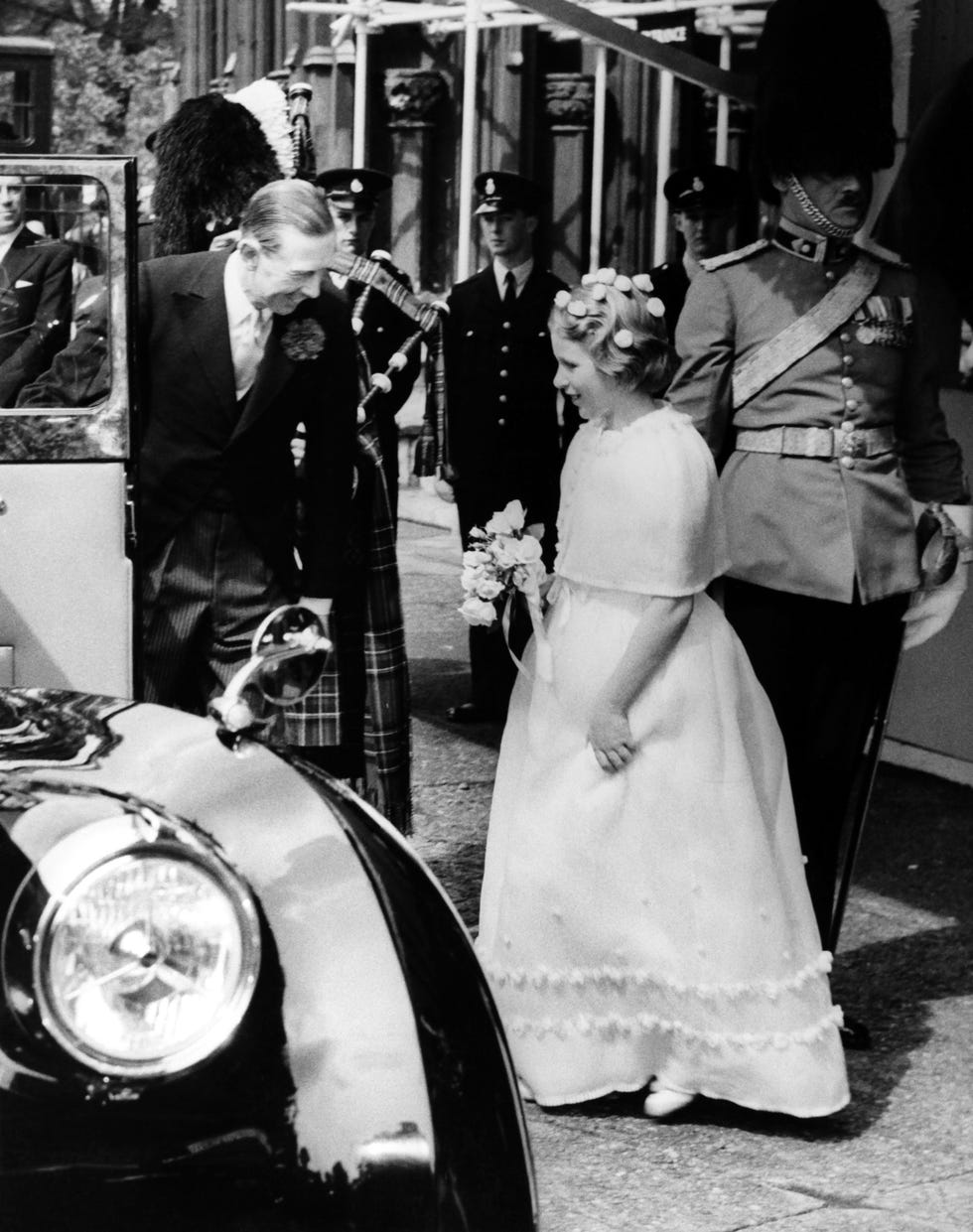 Photograph, Classic, Wedding dress, Bride, Dress, Black-and-white, Vehicle, Gown, Monochrome, Bridal clothing, 