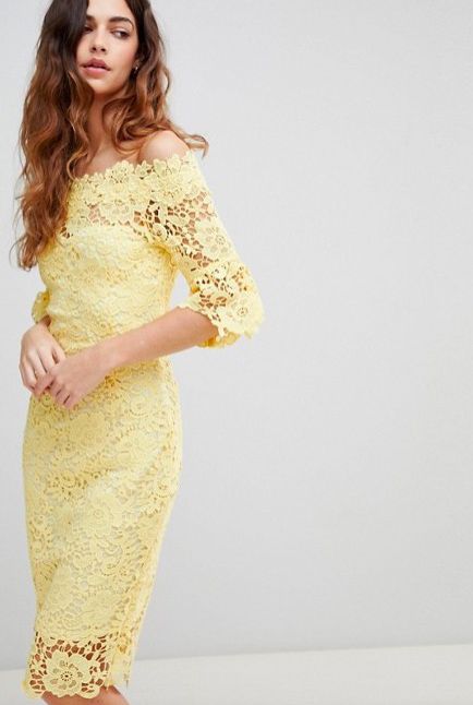Clothing, Fashion model, Dress, Shoulder, Yellow, Cocktail dress, Neck, Joint, Waist, Sleeve, 