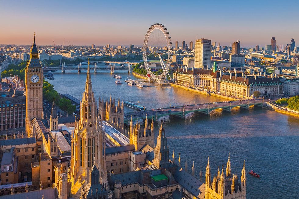 Cityscape, City, Urban area, Landmark, Metropolitan area, Sky, Skyline, Human settlement, Aerial photography, Ferris wheel, 