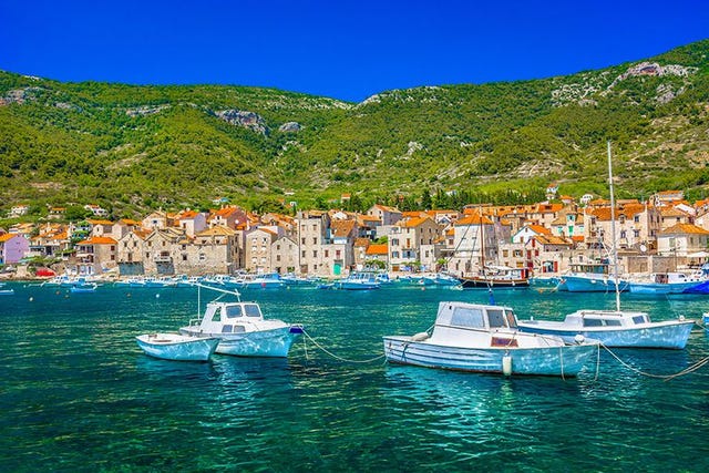 Body of water, Water transportation, Water, Boat, Harbor, Sky, Marina, Sea, Coast, Tourism, 