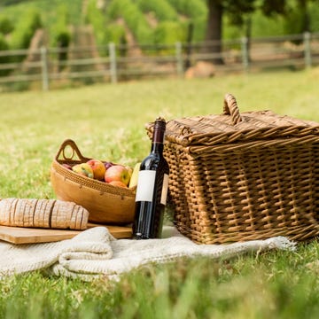Basket, Picnic basket, Picnic, Wicker, Storage basket, Grass, Recreation, Home accessories, 