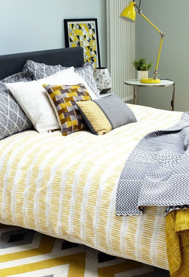 Bedding, Bed sheet, Bed, Yellow, Furniture, Bedroom, Pillow, Bed frame, Room, Duvet cover, 