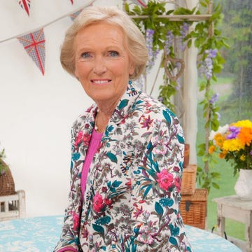 Blond, Outerwear, Textile, Smile, Plant, Floral design, Pattern, Grandparent, Floristry, Flower, 