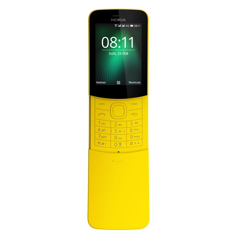 Mobile phone, Gadget, Communication Device, Portable communications device, Feature phone, Yellow, Product, Electronic device, Technology, Material property, 