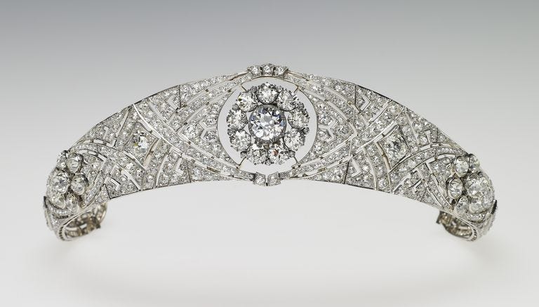 Diamond, Fashion accessory, Jewellery, Platinum, Headpiece, Engagement ring, Metal, Silver, Hair accessory, Ring, 