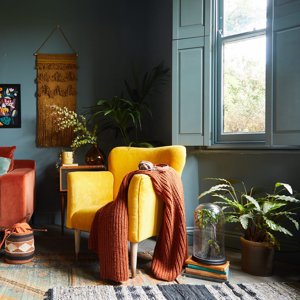 Room, Furniture, Living room, Yellow, Orange, Interior design, Lighting, Table, Lamp, Floor, 
