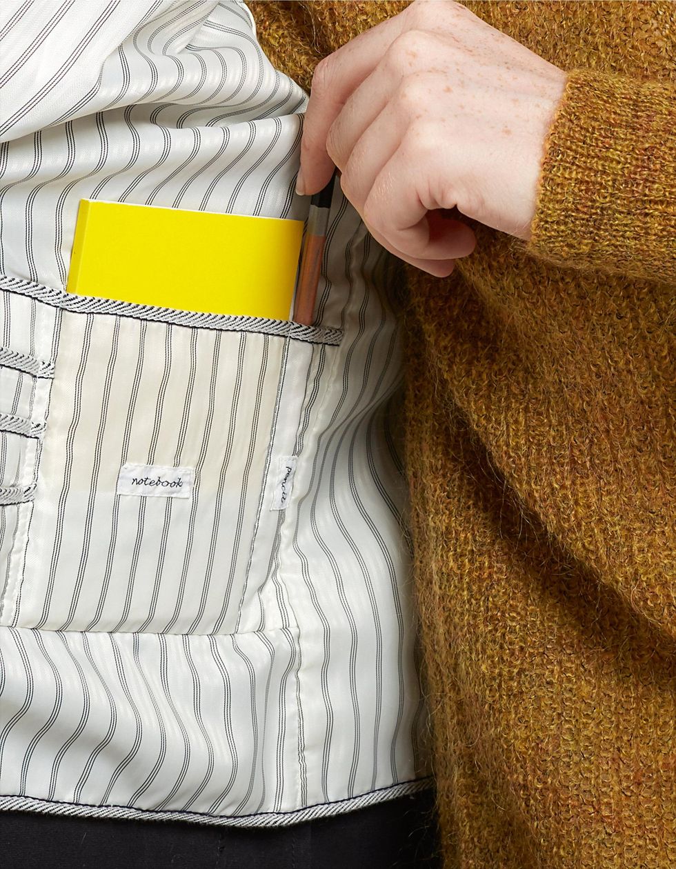 Yellow, Arm, Hand, Outerwear, Beige, Textile, Waist, Pocket, Sleeve, Pattern, 