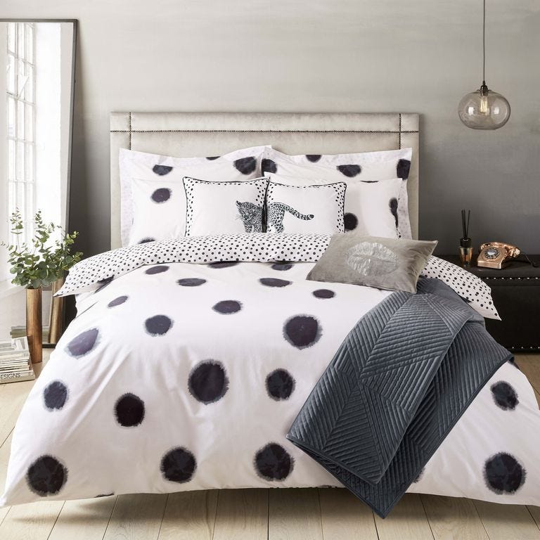 Bed sheet, Bedding, White, Bed frame, Bed, Bedroom, Duvet cover, Polka dot, Textile, Pattern, 