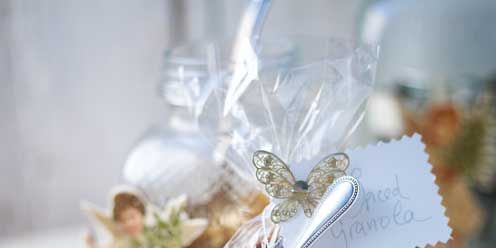Glass, Present, Wedding favors, Confectionery, Souvenir, Porcelain, Silver, Artificial flower, Cut flowers, Party favor, 