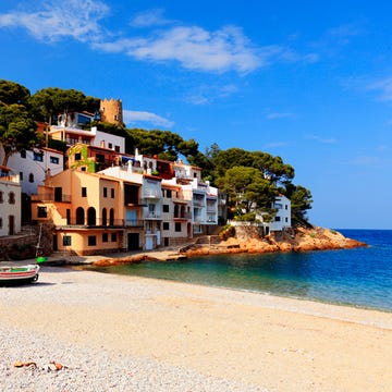 Coastal and oceanic landforms, Coast, Shore, Building, Town, House, Azure, Sea, Ocean, Beach, 