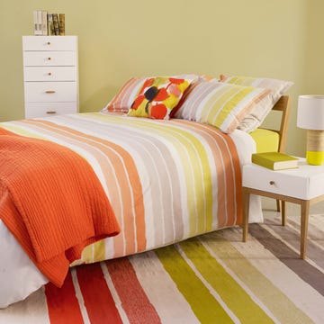 Bed, Room, Green, Yellow, Bedding, Interior design, Bedroom, Textile, Bed sheet, Furniture, 