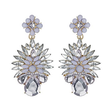 Art, Body jewelry, Pattern, Gemstone, Brooch, Silver, Symmetry, Creative arts, Design, Natural material, 