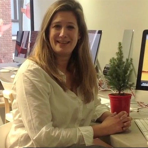 Eyebrow, Electronic device, Flowerpot, Sitting, Table, Display device, Office equipment, Input device, Computer keyboard, Computer hardware, 