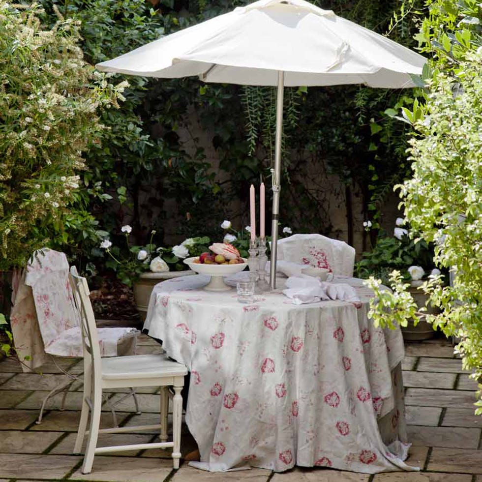 Tablecloth, Table, Furniture, Linens, Umbrella, Outdoor table, Chair, Home accessories, Shade, Outdoor furniture, 