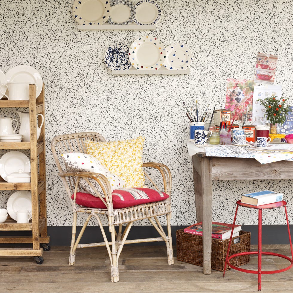 Room, Furniture, Interior design, Wall, Shelving, Interior design, Wallpaper, End table, Stool, Peach, 