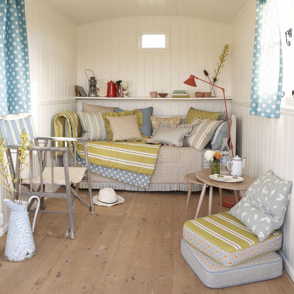 Interior design, Room, Green, Textile, Home, Furniture, Floor, Living room, Couch, Flooring, 