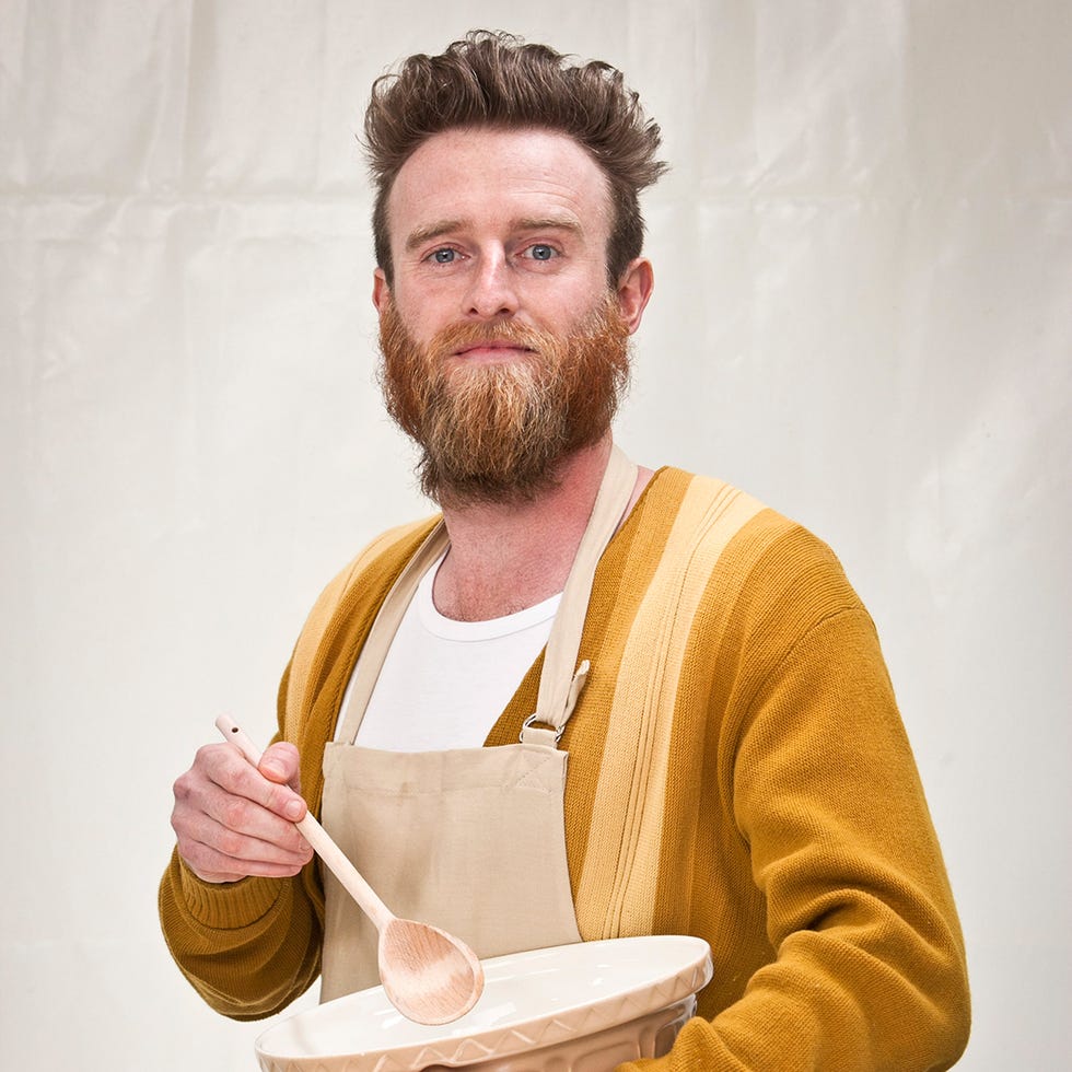 Facial hair, Hairstyle, Beard, Jaw, Moustache, Sweater, Chest, Peach, Brown hair, Ice cream, 