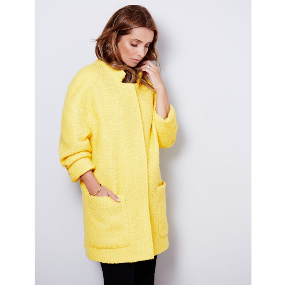 Yellow, Sleeve, Human body, Textile, Joint, Standing, Street fashion, Woolen, Cardigan, Top, 