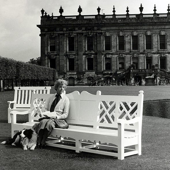 Outdoor furniture, Sitting, Comfort, Bench, Carnivore, Outdoor bench, Monochrome, Dog breed, Dog, Companion dog, 