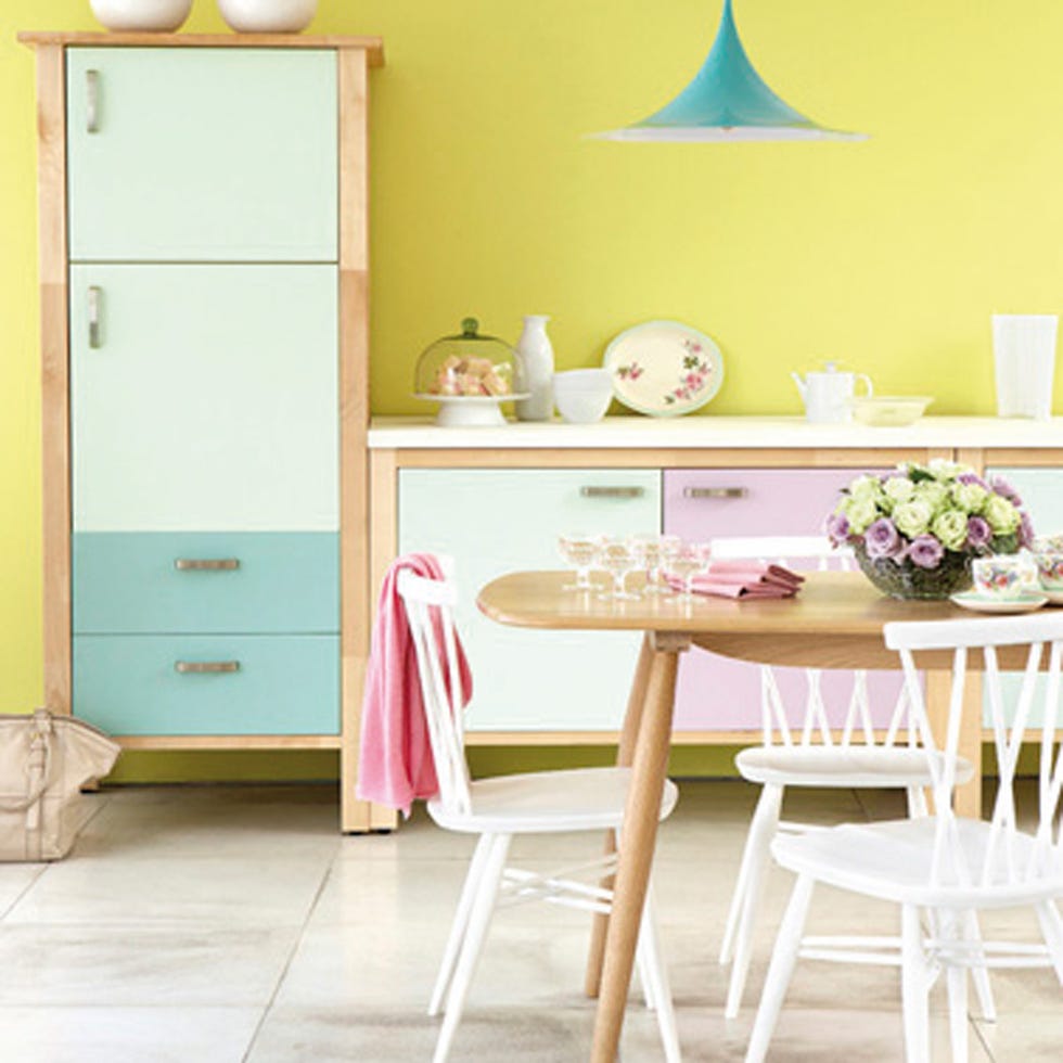 Room, Yellow, Furniture, Table, Floor, Interior design, Cabinetry, Party hat, Chair, Turquoise, 