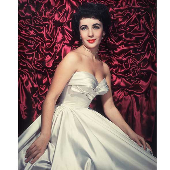 Hairstyle, Strapless dress, Shoulder, Dress, Style, Formal wear, Gown, Bridal clothing, Fashion model, Beauty, 