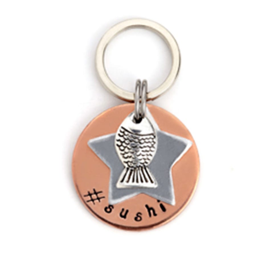 Metal, Keychain, Circle, Pendant, Symbol, Silver, Body jewelry, Nickel, Platinum, Silver, 