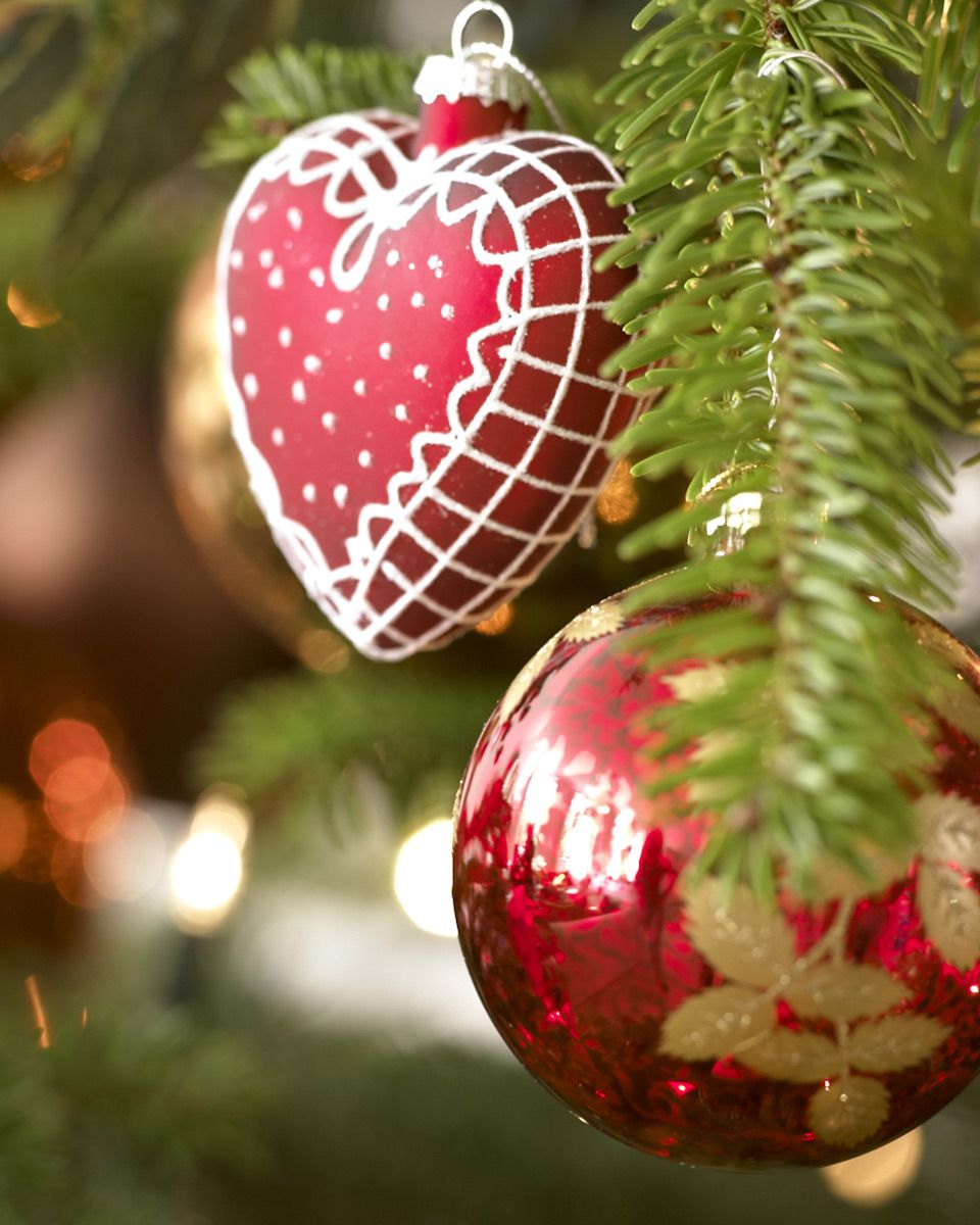 Event, Christmas decoration, Red, Christmas ornament, Holiday ornament, Christmas, Holiday, Ornament, Sphere, Interior design, 
