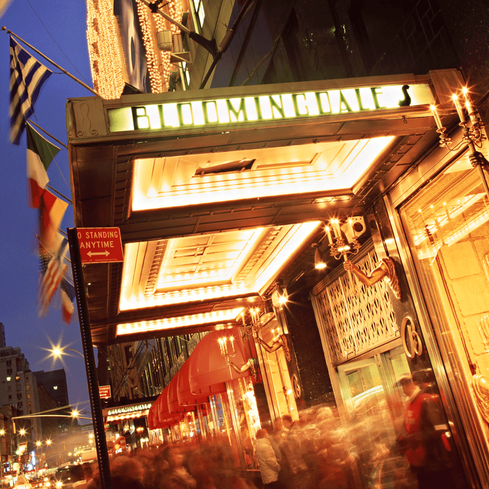 Lighting, Flag, Amber, Flag of the united states, Light fixture, Electricity, Pole, Downtown, Market, Electronic signage, 
