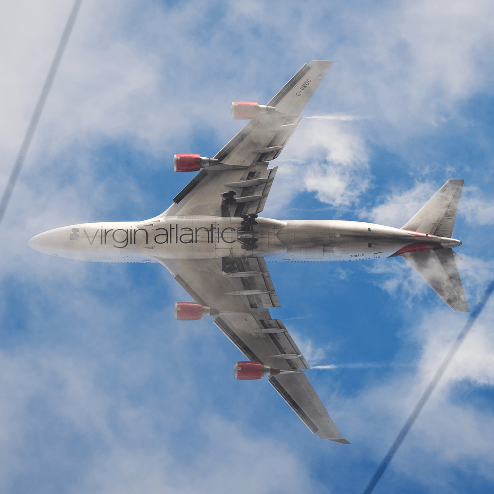 Airplane, Sky, Daytime, Aircraft, Cloud, Flight, Jet aircraft, Air travel, Atmosphere, Aviation, 