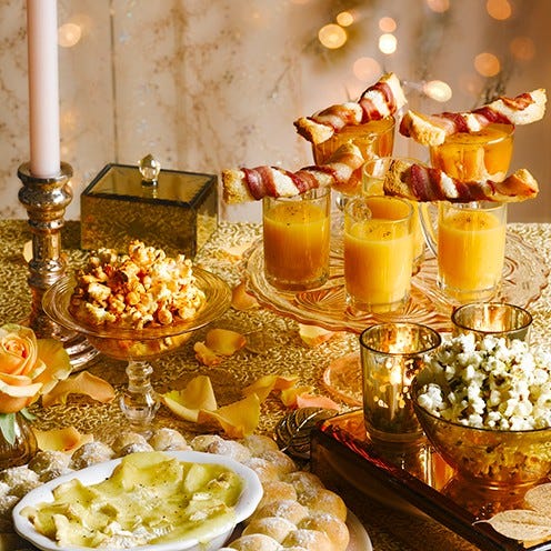 Serveware, Dish, Candle, Wax, Cuisine, Meal, Interior design, Centrepiece, Peach, Candle holder, 