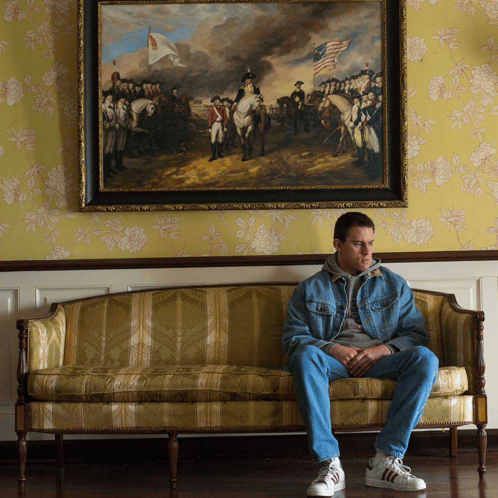 Human, Textile, Denim, Jeans, Sitting, Wall, Picture frame, Interior design, Art, Street fashion, 