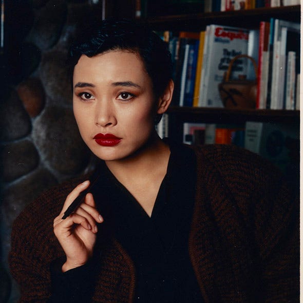 Lip, Mouth, Finger, Eyebrow, Shelf, Eyelash, Bookcase, Shelving, Nail, Gesture, 