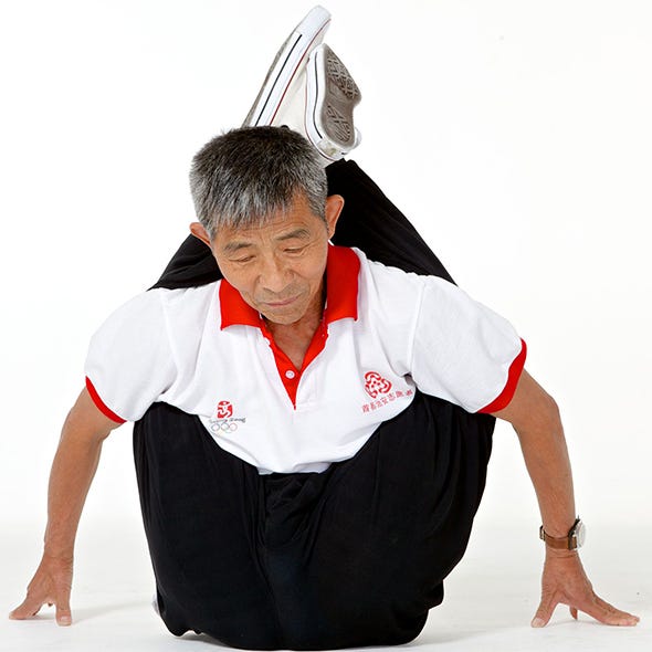 Finger, Sleeve, Shoulder, Elbow, Joint, Wrist, Collar, Sitting, Uniform, Costume accessory, 