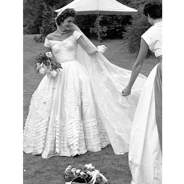 Clothing, Shoulder, Bridal clothing, Dress, Petal, Textile, Photograph, White, Gown, Wedding dress, 