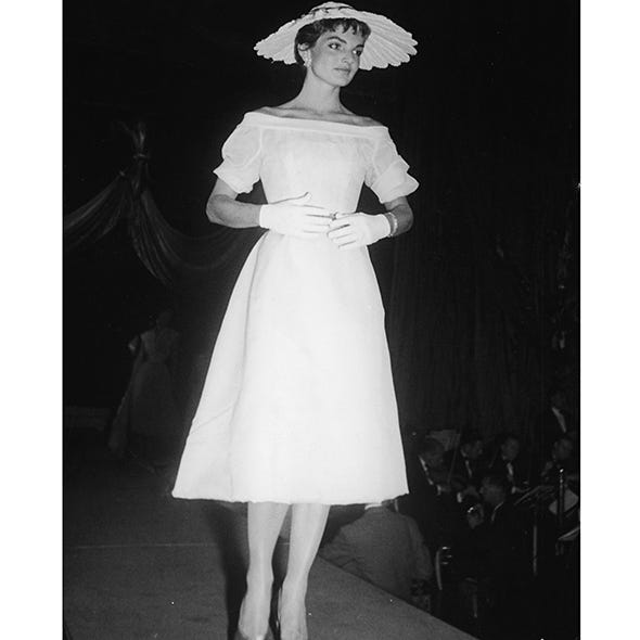 Clothing, Shoulder, Dress, Joint, Hat, Formal wear, Style, Gown, One-piece garment, Headgear, 