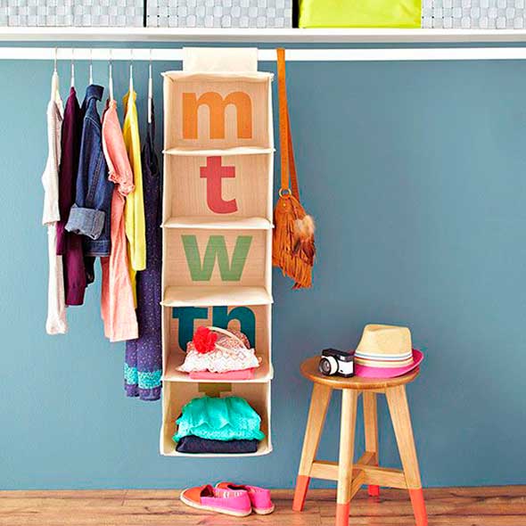 Textile, Clothes hanger, Bag, Home accessories, Teal, Shoulder bag, Peach, Stool, Visual arts, Collection, 