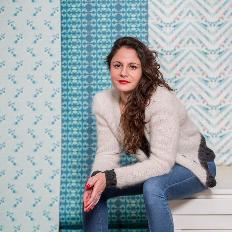Clothing, Blue, Sleeve, Denim, Shoulder, Textile, Jeans, Pattern, Sitting, Sweater, 
